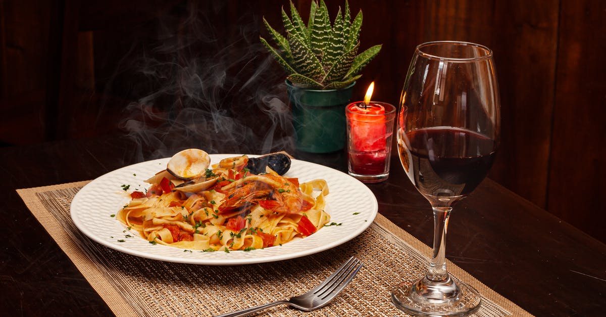 How to keep pasta hot, yet not sticky in crock pot? - Seafood Pasta Dish on the Table How to keep pasta hot, yet not sticky in crock pot? - Seafood Pasta Dish on the Table