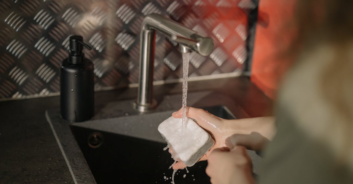 How to keep thin sponge bases moist? - Person Holding White Paper Near Stainless Steel Faucet How to keep thin sponge bases moist? - Person Holding White Paper Near Stainless Steel Faucet