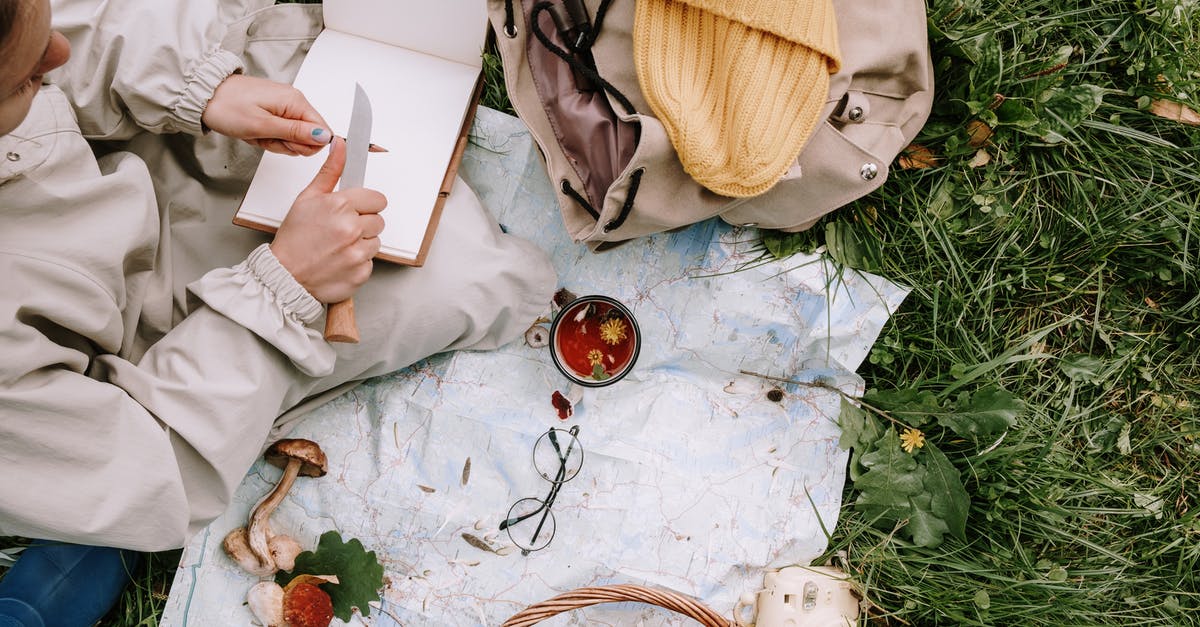 How to know if I am stopping sharpening too early? - Person Holding White Box Near Brown Leather Bag and White Ceramic Mug on Green Grass