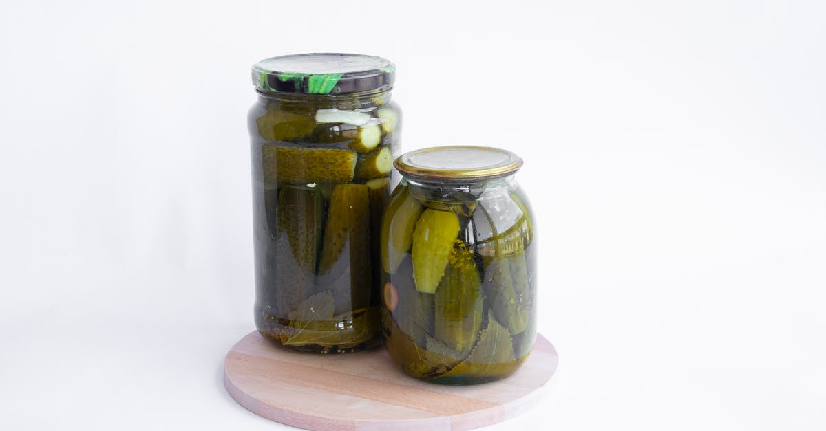 How to know when pickles are pickled correctly - Two Clear Glass Jars Of Preserved Pickles On A Cutting Board How to know when pickles are pickled correctly - Two Clear Glass Jars Of Preserved Pickles On A Cutting Board