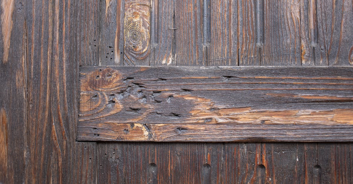 How to layer a Lasagne - Textured background of weathered brown aged wooden wall with scratches and holes differently directed boards