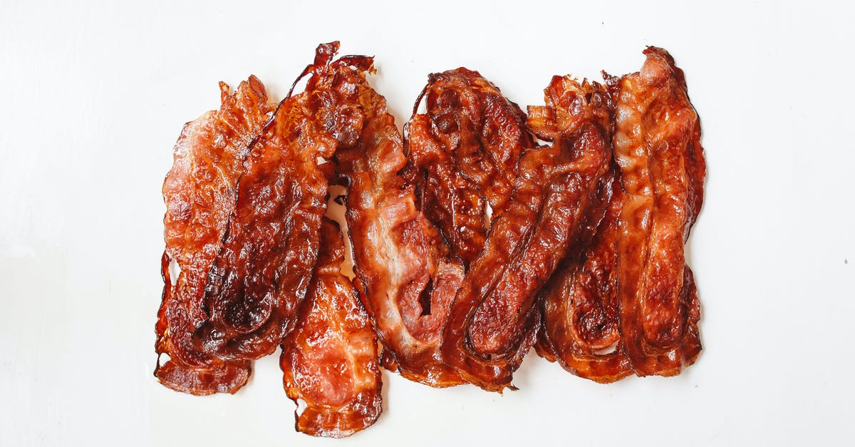 How to make a split oil sauce - Fried Strips Of Meat On White Surface How to make a split oil sauce - Fried Strips Of Meat On White Surface