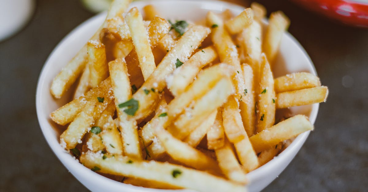 How to make crispy French fries? - Potato Fries on White Ceramic Bowl How to make crispy French fries? - Potato Fries on White Ceramic Bowl