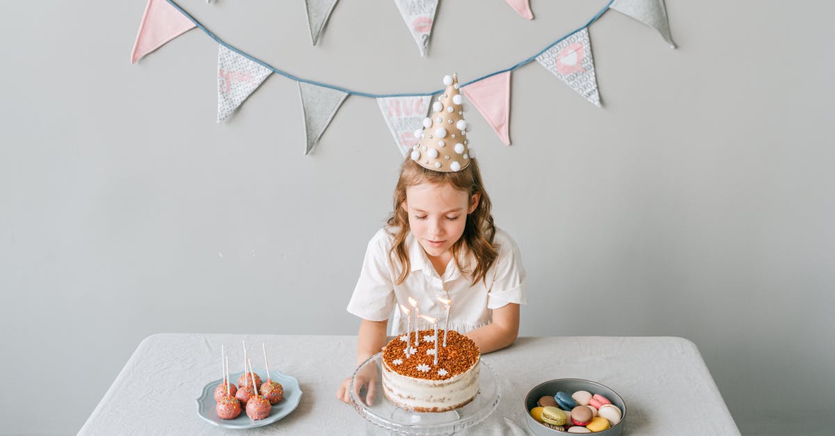 How to make good looking cake pops? - Girl in Party Hat With Birthday Cake How to make good looking cake pops? - Girl in Party Hat With Birthday Cake