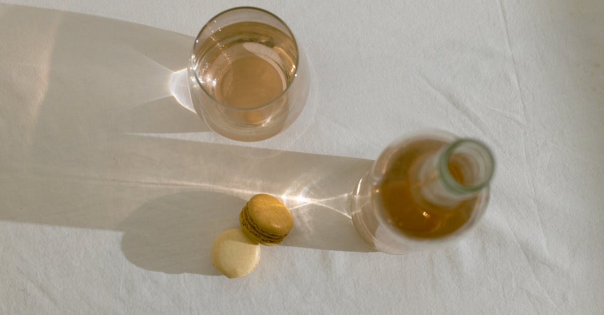 How to make meatball style food that keeps its shape - Glass bottle near edible macarons on table How to make meatball style food that keeps its shape - Glass bottle near edible macarons on table