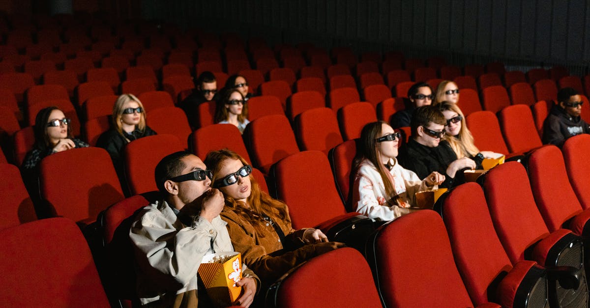 How to make Movie Theatre like Popcorn? - People Sitting on Red Chairs How to make Movie Theatre like Popcorn? - People Sitting on Red Chairs