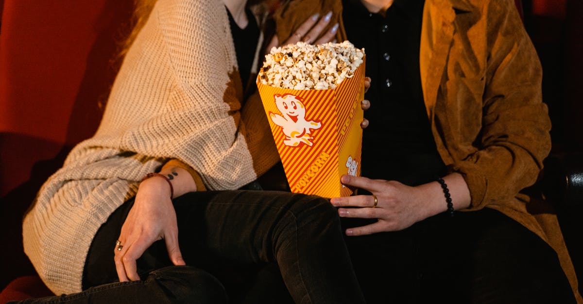 How to make Movie Theatre like Popcorn? - Couple with Popcorn on Yellow Tumbler How to make Movie Theatre like Popcorn? - Couple with Popcorn on Yellow Tumbler
