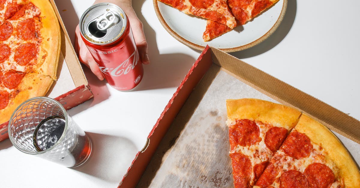 How to make mozzarella from curd? - Person Holding Coca-Cola In Can Beside Pizza on Table How to make mozzarella from curd? - Person Holding Coca-Cola In Can Beside Pizza on Table