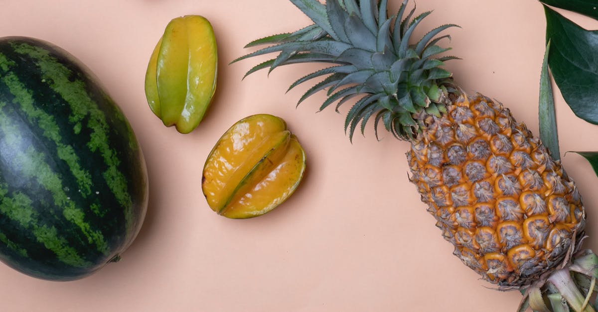 How to make sorbet from fruit like watermelon? - Pineapple and carambolas placed near watermelon and palm leaf