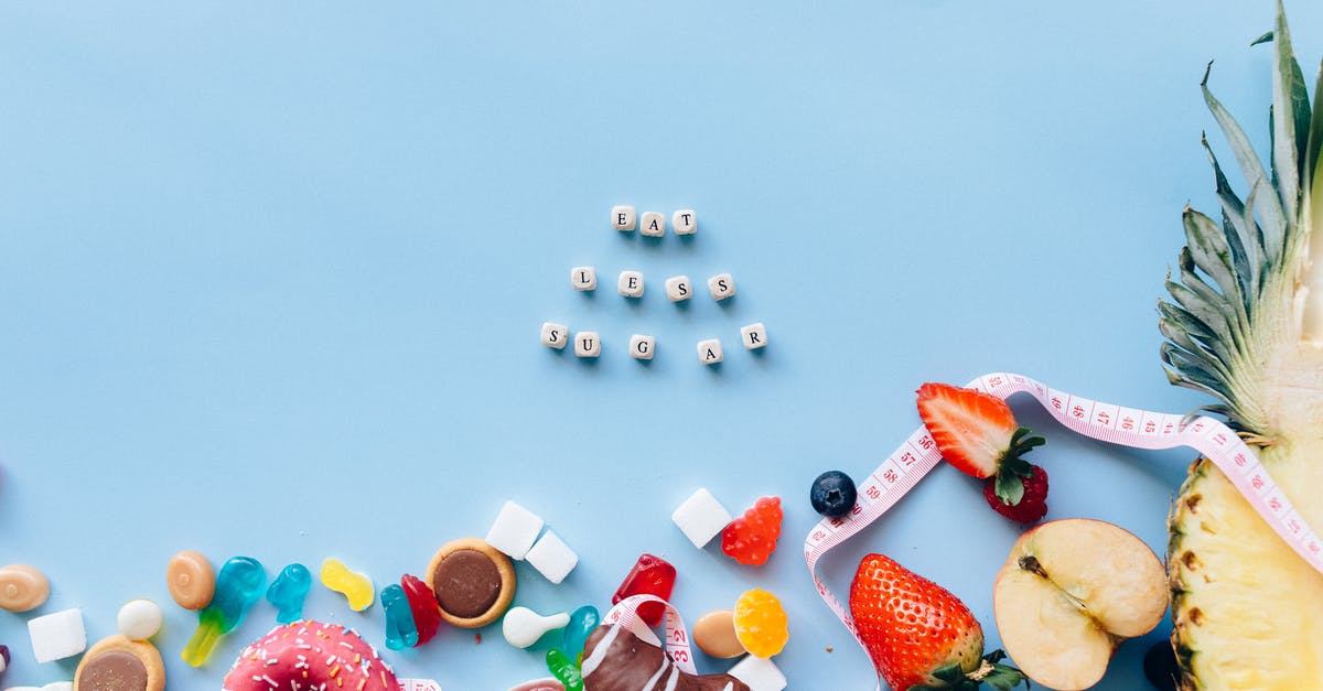 How to make spherical chocolate-enrobed candies? - Assorted Candies and Chocolates on White Table How to make spherical chocolate-enrobed candies? - Assorted Candies and Chocolates on White Table