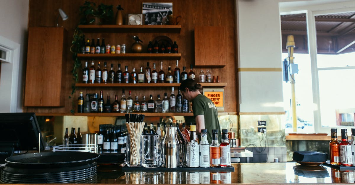 How to make the perfect root beer - Man in Green Shirt Standing in Front of Brown Wooden Shelf How to make the perfect root beer - Man in Green Shirt Standing in Front of Brown Wooden Shelf