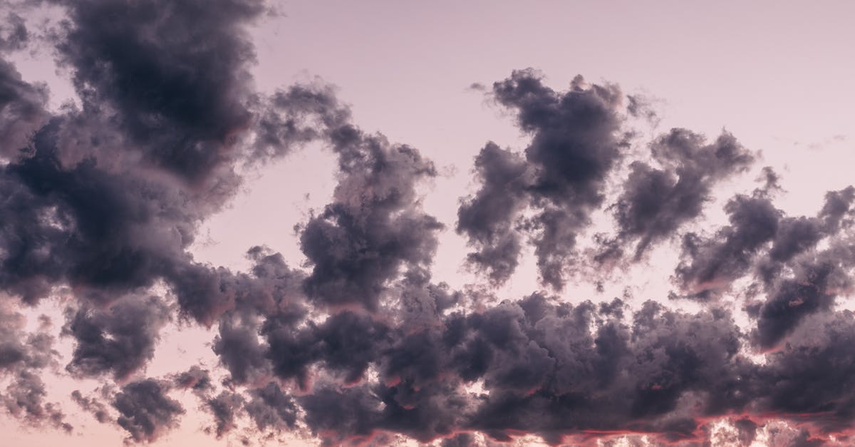 How to make thick and fluffy pancakes? - From below of dark fluffy clouds floating in sky in summer evening at sundown How to make thick and fluffy pancakes? - From below of dark fluffy clouds floating in sky in summer evening at sundown