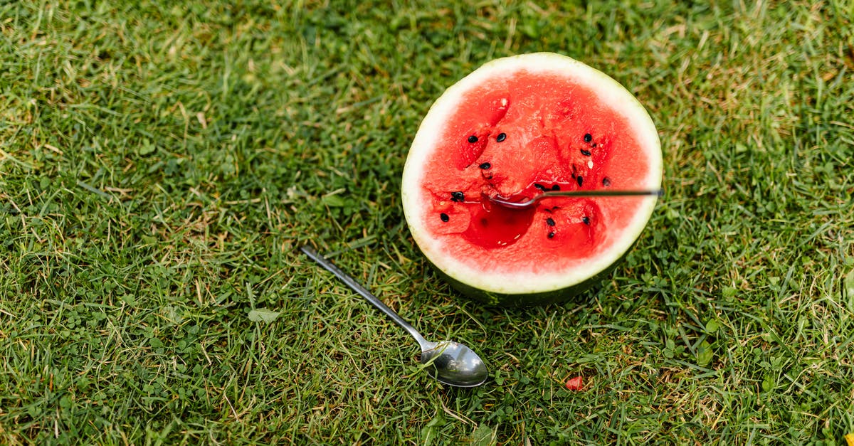 How to make XXL Watermelon Jell-O Shots without falling apart? - Sliced Watermelon with Spoon on the Grass How to make XXL Watermelon Jell-O Shots without falling apart? - Sliced Watermelon with Spoon on the Grass