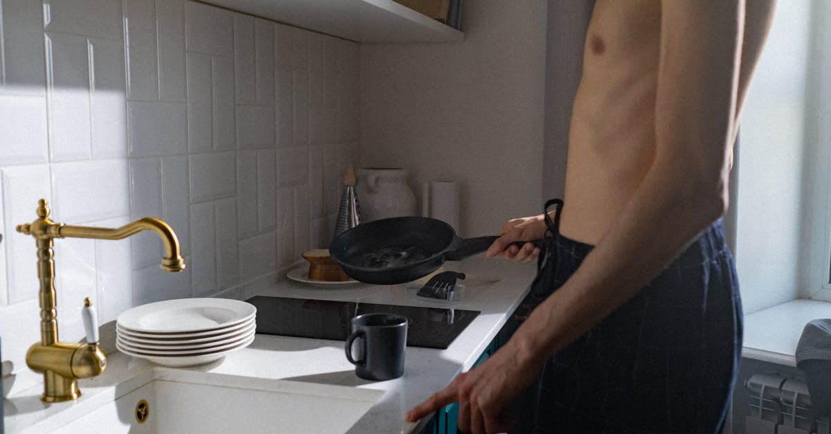 How to melt butter most conveniently? - Topless Man Standing in Front of Sink How to melt butter most conveniently? - Topless Man Standing in Front of Sink