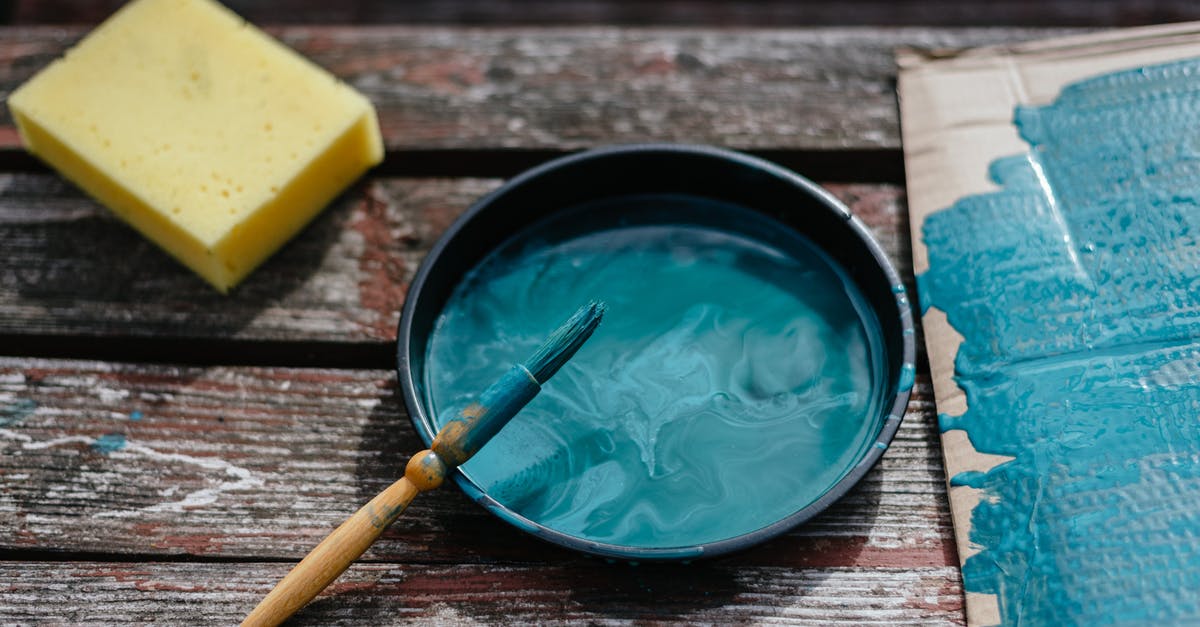 How to mix large amounts of sponge for bread? - From above of turquoise paint in bowl with brush placed on wooden board near cardboard and sponge during repair work How to mix large amounts of sponge for bread? - From above of turquoise paint in bowl with brush placed on wooden board near cardboard and sponge during repair work