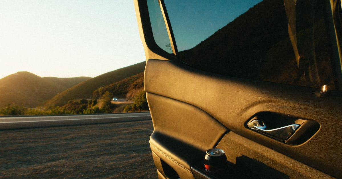 How to open a can of olive oil? - Car With Opened Door Near Road
