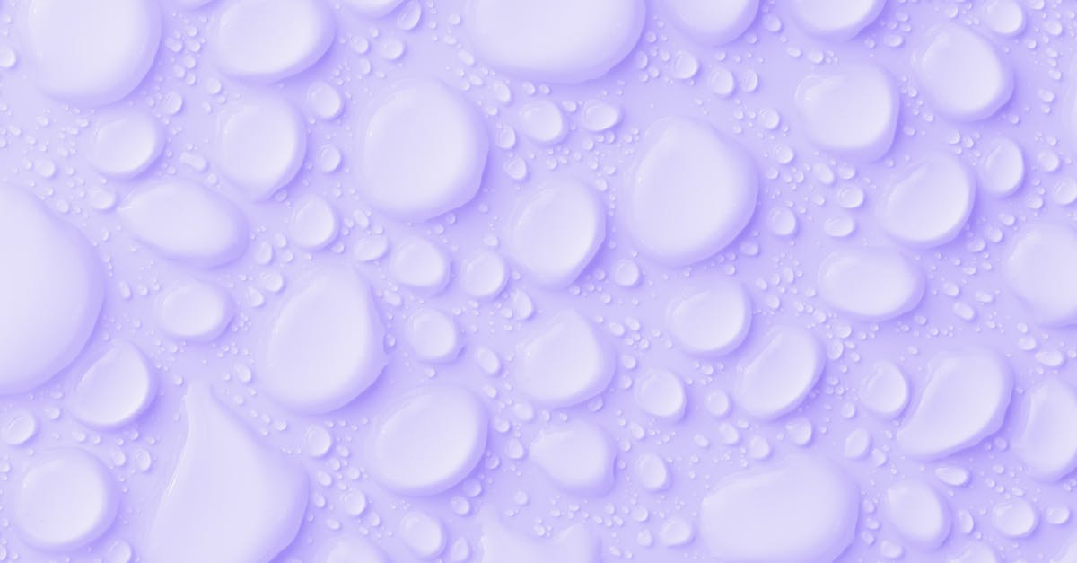 How to pack items that may leak liquids for lunch? - Waterdrops On Purple Background How to pack items that may leak liquids for lunch? - Waterdrops On Purple Background