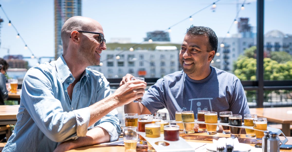 How to Pair for Beer Tastings - Two Men Drinking Outside Restaurant How to Pair for Beer Tastings - Two Men Drinking Outside Restaurant