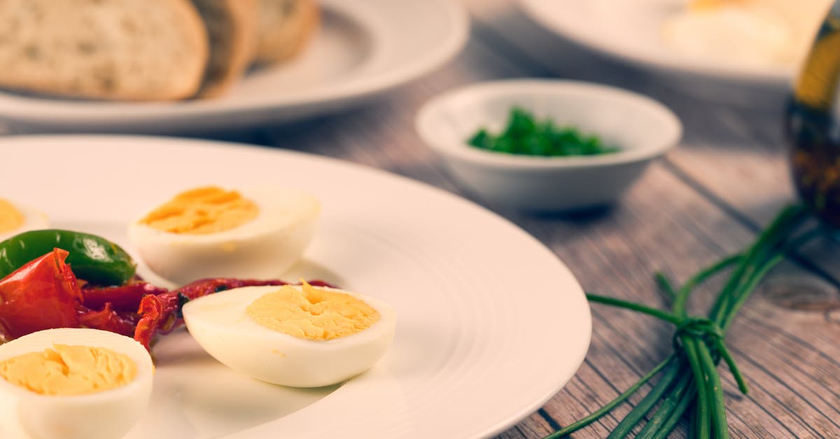 How to peel hard boiled eggs easily? - Slices of Hard Boiled Egg on Plate How to peel hard boiled eggs easily? - Slices of Hard Boiled Egg on Plate