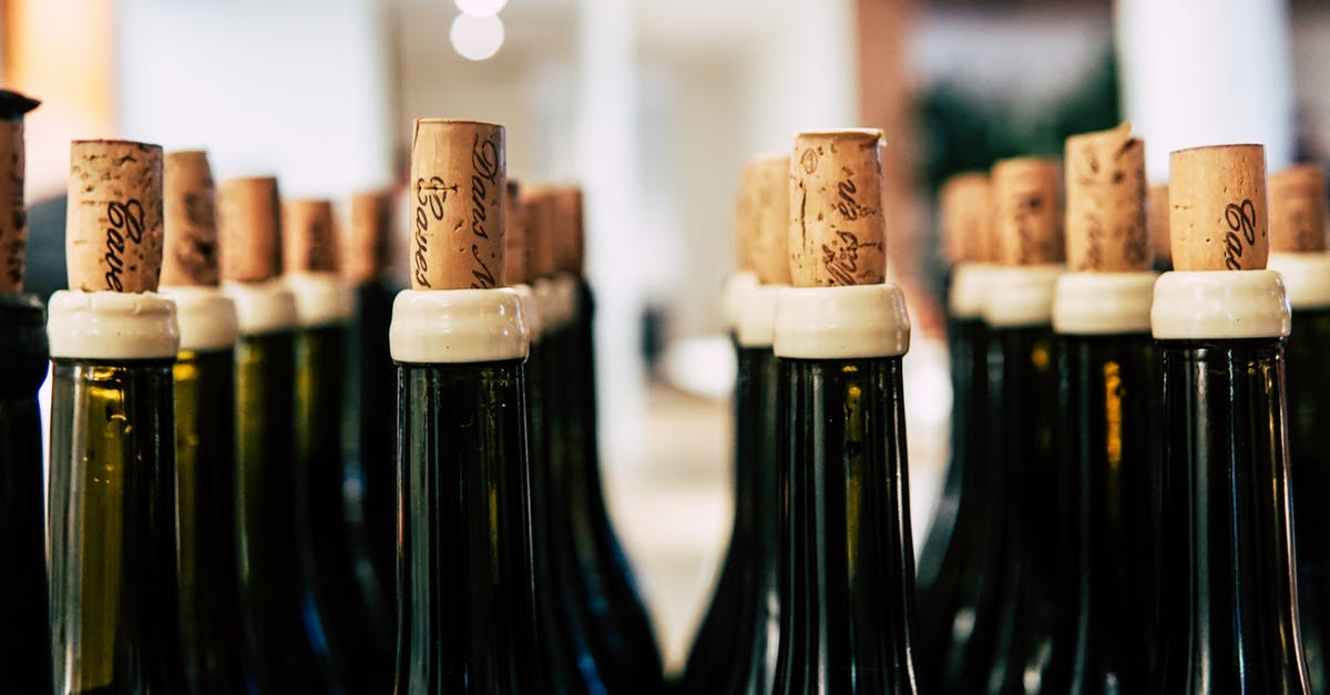 How to pop a tiny champagne cork? - Close-up Photo of Wine Bottles With Cork How to pop a tiny champagne cork? - Close-up Photo of Wine Bottles With Cork