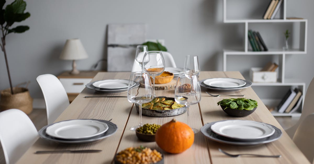 How to Prepare Chickpea Purée from a Can? - From above of wooden table served with various vegetarian dishes and empty glasses for guests How to Prepare Chickpea Purée from a Can? - From above of wooden table served with various vegetarian dishes and empty glasses for guests