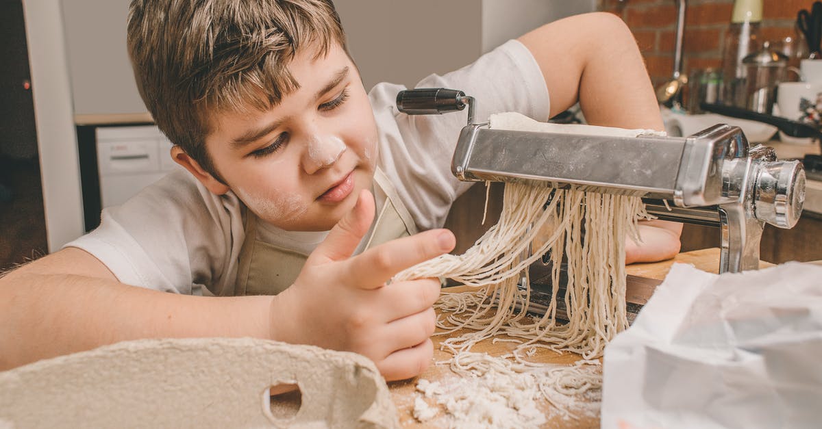 How to prepare shirataki noodles to more closely resemble classic pasta? - A Boy Looking at Fresh Pasta Noodles at a Pasta Maker How to prepare shirataki noodles to more closely resemble classic pasta? - A Boy Looking at Fresh Pasta Noodles at a Pasta Maker