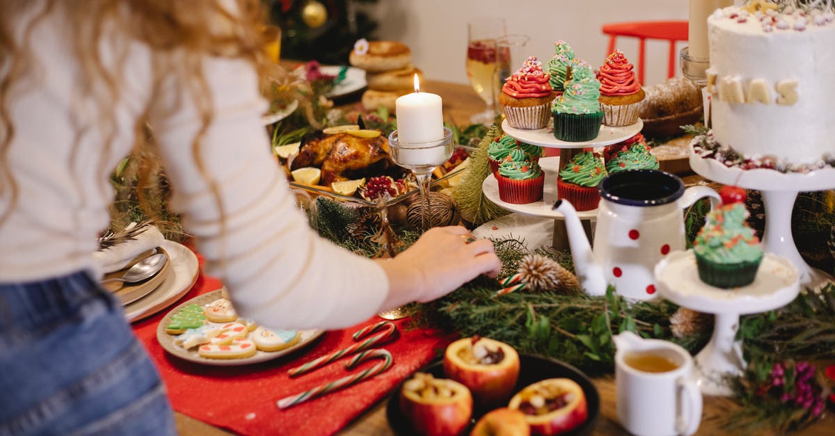 How to prepare stuffed peppers? - Crop woman preparing stuffed apples on Christmas day How to prepare stuffed peppers? - Crop woman preparing stuffed apples on Christmas day
