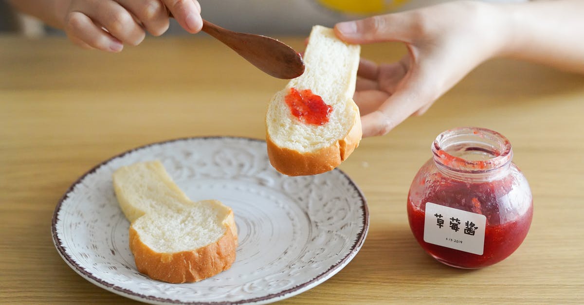 How to preserve a spread in a jar - Person Holding Bread How to preserve a spread in a jar - Person Holding Bread