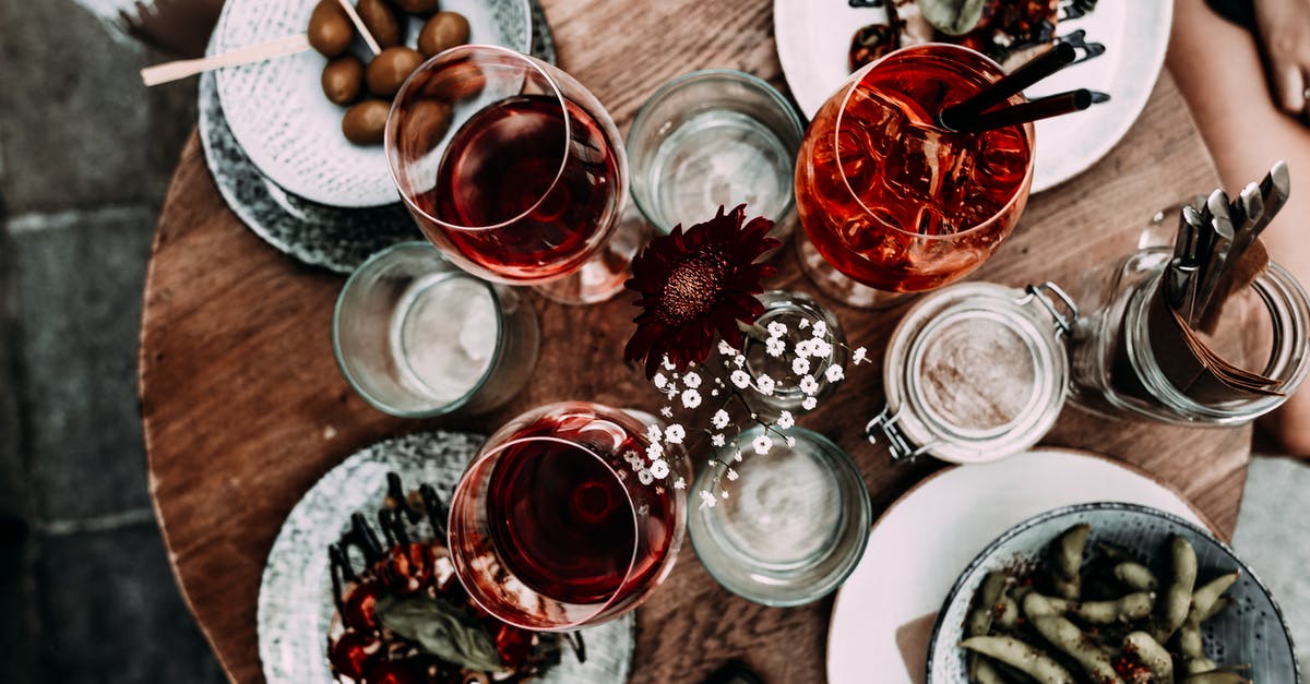 How to preserve fermented bean sauce - Anonymous person near table with glasses and meals How to preserve fermented bean sauce - Anonymous person near table with glasses and meals