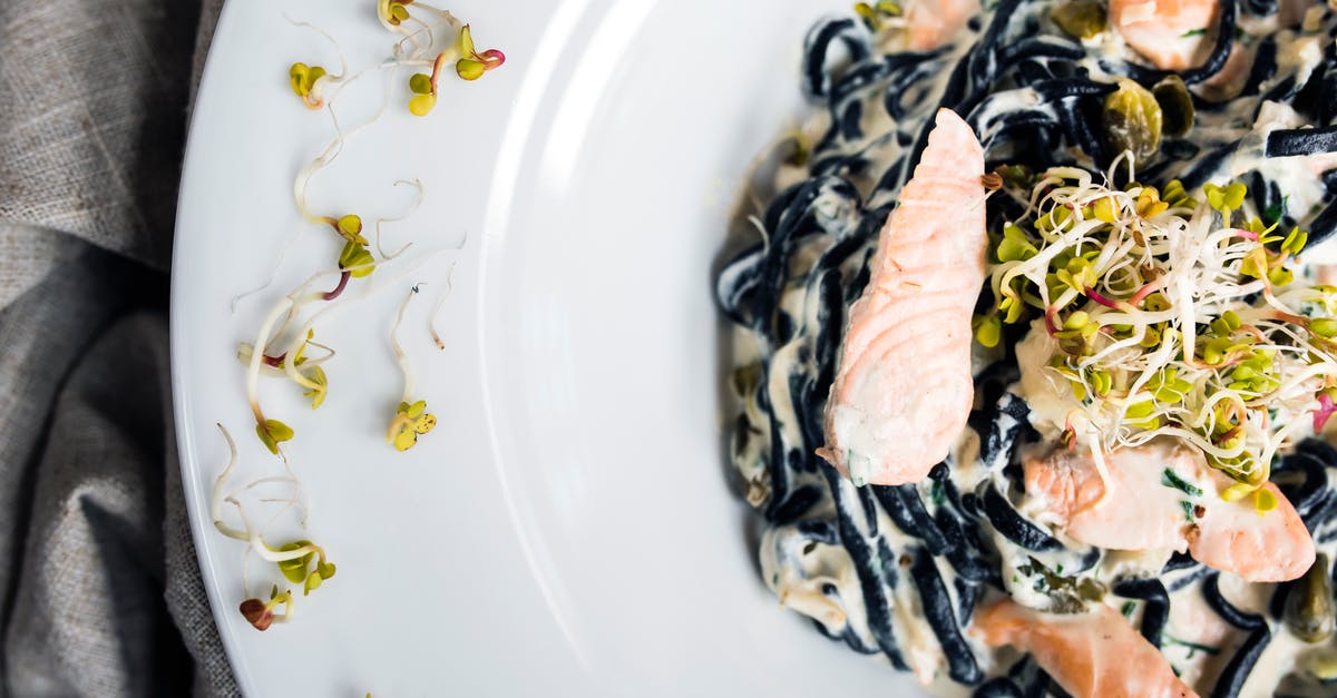 How to prevent creamy sauces from separating upon reheating? - Tasty pasta with fish slices and seed sprouts How to prevent creamy sauces from separating upon reheating? - Tasty pasta with fish slices and seed sprouts