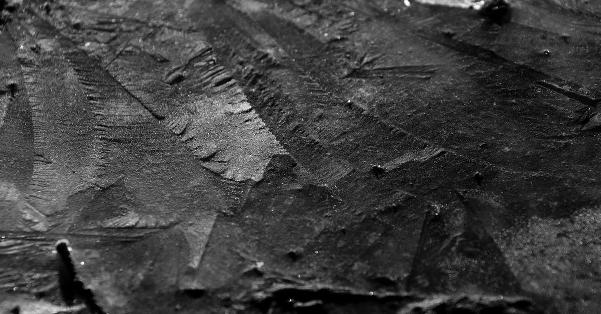 How to prevent eggplant having a tough or rubbery texture - From above black and white closeup of textured background representing geologic rock with uneven surface How to prevent eggplant having a tough or rubbery texture - From above black and white closeup of textured background representing geologic rock with uneven surface