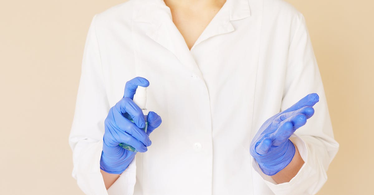 How to prevent liquid-y marinara sauce - Crop unrecognizable hospital worker in white uniform spraying antiseptic liquid over hands in blue latex gloves How to prevent liquid-y marinara sauce - Crop unrecognizable hospital worker in white uniform spraying antiseptic liquid over hands in blue latex gloves