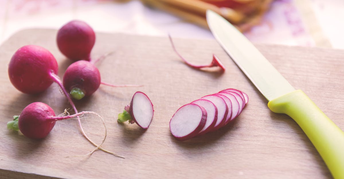 How to prevent sliced vegetables/roots from sticking to the blade - Green and Silver Kitchen Knife Beside Pink Onions How to prevent sliced vegetables/roots from sticking to the blade - Green and Silver Kitchen Knife Beside Pink Onions