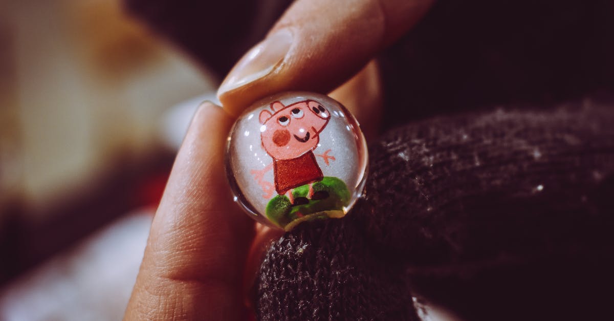 How to protect hand skin when preparing food - Person Holding Peppa Pig Toy Marble How to protect hand skin when preparing food - Person Holding Peppa Pig Toy Marble