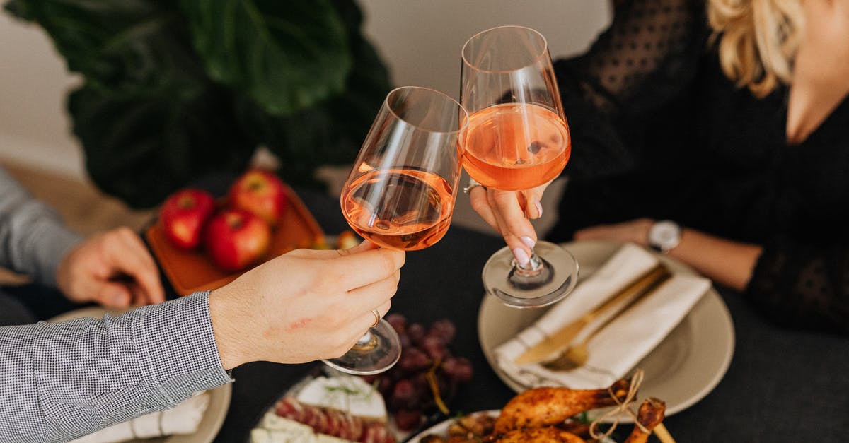 How to quickly and safely defrost chicken? - Person Holding Clear Wine Glass With Red Wine