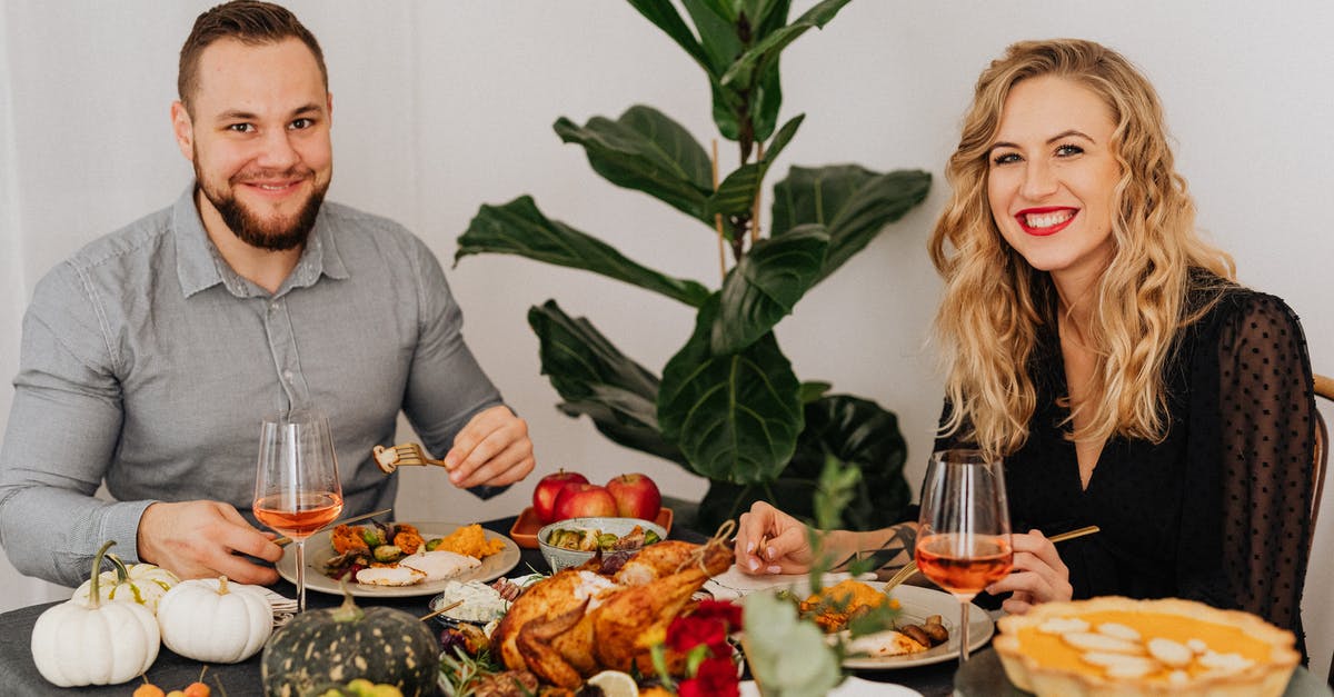 How to quickly and safely defrost chicken? - Man and Woman Sitting on Chair in Front of Table With Foods
