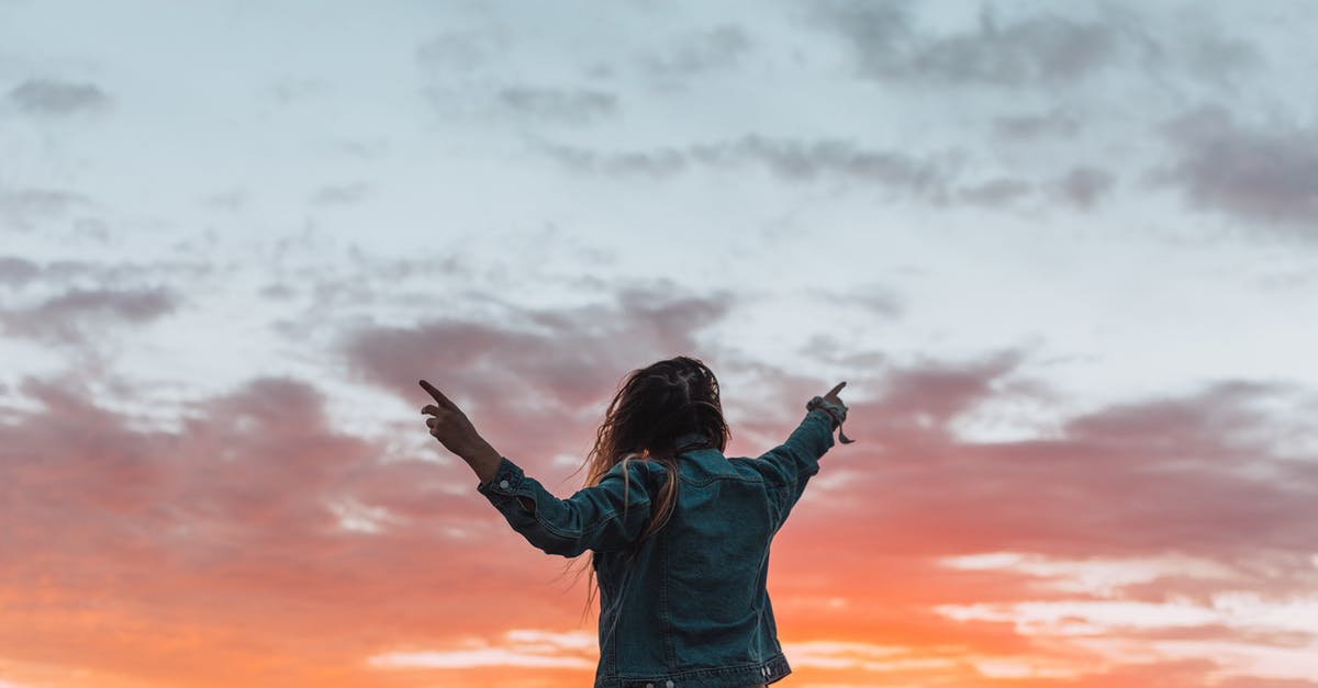 How to raise the setting and melting point of gelatin - Back view of anonymous female in denim apparel showing colorful cloudy sky with fingers while contemplating sundown How to raise the setting and melting point of gelatin - Back view of anonymous female in denim apparel showing colorful cloudy sky with fingers while contemplating sundown