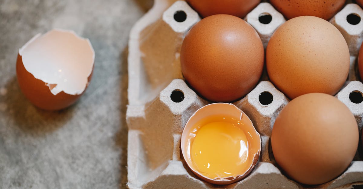How to remove bits of egg shell from a cracked egg? - Broken egg in row with in carton box How to remove bits of egg shell from a cracked egg? - Broken egg in row with in carton box
