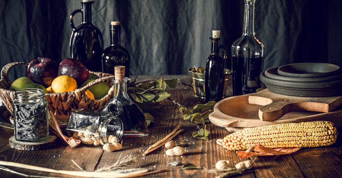 How to salvage hardened peanut butter from jar bottom - Assorted fruits and bottles on table with corn and rustic tableware How to salvage hardened peanut butter from jar bottom - Assorted fruits and bottles on table with corn and rustic tableware