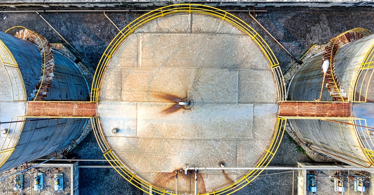 How to saute without oil on stainless steel pots/pans? - Top view of huge industrial tanks connected with rusty passages located at territory of factory How to saute without oil on stainless steel pots/pans? - Top view of huge industrial tanks connected with rusty passages located at territory of factory