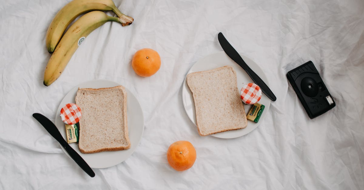 How to seal a jar with a jam so that it can be opened without breaking the lid? - Bread loafs near fresh fruits and jars of jam How to seal a jar with a jam so that it can be opened without breaking the lid? - Bread loafs near fresh fruits and jars of jam