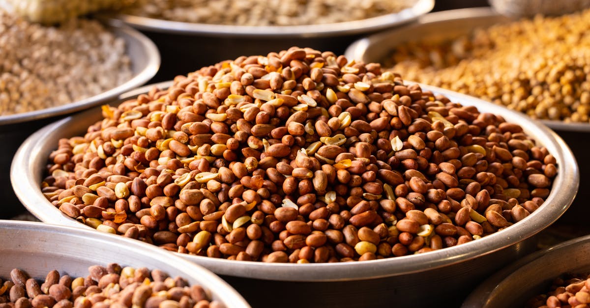 How to separate peanut oil from roasted peanuts at home? - Roasted Nuts on Stainless Bowls How to separate peanut oil from roasted peanuts at home? - Roasted Nuts on Stainless Bowls