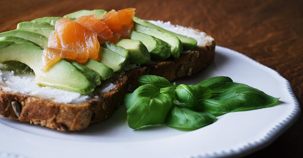 How to slice smoked salmon really thinly? - Bread With Sliced Avocado and Salmon Near Basil Mint on Plate How to slice smoked salmon really thinly? - Bread With Sliced Avocado and Salmon Near Basil Mint on Plate