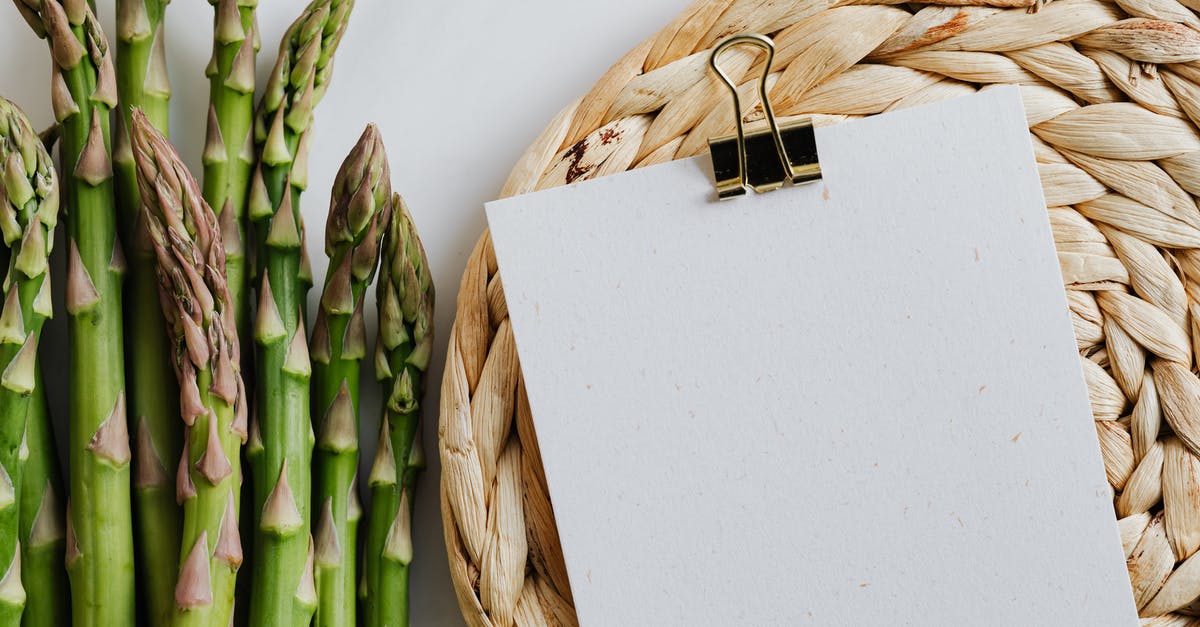 How to sprout quinoa (and other grains) safely - Paper sheets fastened by paper clip and asparagus
