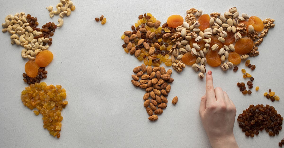 How to stop burning raisins in my fruit scones - Faceless person making world map with nuts and dried fruits How to stop burning raisins in my fruit scones - Faceless person making world map with nuts and dried fruits