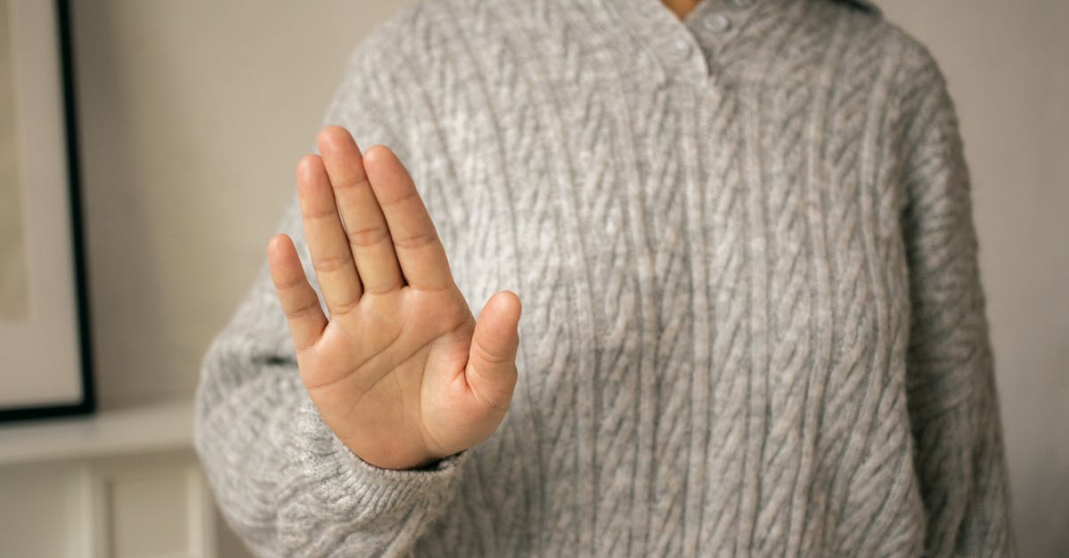 How to stop meatballs falling apart when frying - Crop woman in gray knitted jumper doing stop gesture How to stop meatballs falling apart when frying - Crop woman in gray knitted jumper doing stop gesture