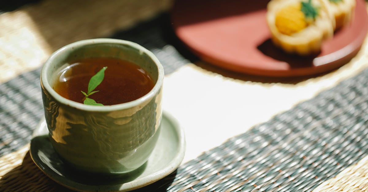 How to stop mint flavor dying when cooking? - High angle of fresh black tea with green mint leaves in oriental cup with saucer on straw mat How to stop mint flavor dying when cooking? - High angle of fresh black tea with green mint leaves in oriental cup with saucer on straw mat