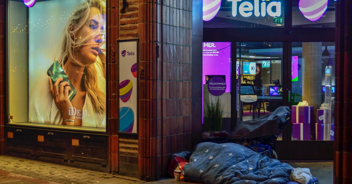 How to store a Christmas pudding to make it drier? - Person Sleeping In Pavement Near Glass Window