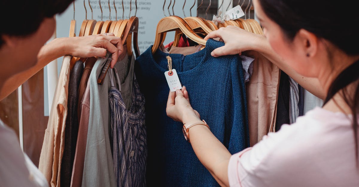 How to store garlic? - Woman in White Shirt Holding Blue Denim Jeans How to store garlic? - Woman in White Shirt Holding Blue Denim Jeans