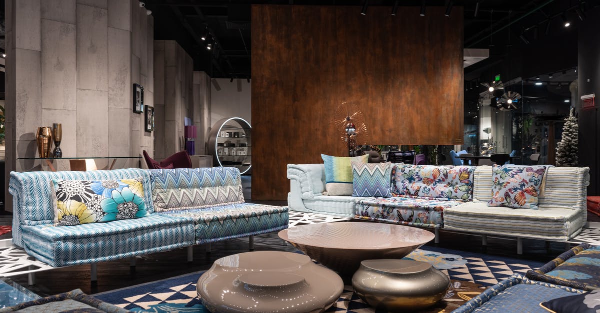 How to store live scallops? - Comfortable sofas with colorful cushions and creative coffee tables placed on carpet in modern spacious furniture store How to store live scallops? - Comfortable sofas with colorful cushions and creative coffee tables placed on carpet in modern spacious furniture store